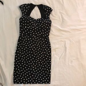 Black with white polka dots. Cap sleeve dress